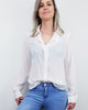 Witte blouse met parelmouwen